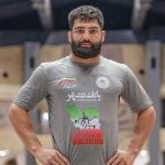 مدال برنز اتحادیه جهانی کشتی بر گردن علی سوادکوهی